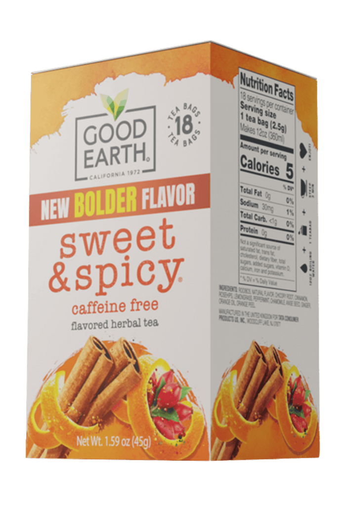 A box of Good Earth California 1973 'New Bolder Flavor Sweet & Spicy' caffeine-free herbal tea, featuring orange and white packaging with illustrations of cinnamon sticks and citrus slices.