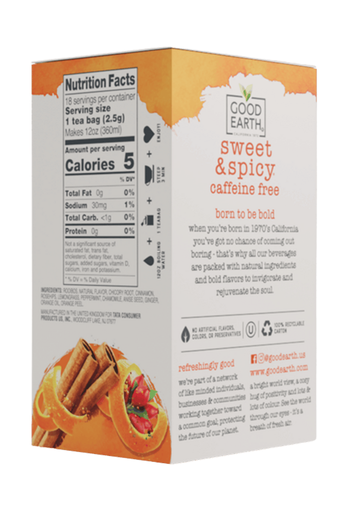 A box of Good Earth Sweet & Spicy Caffe Free tea bags, featuring a white and orange design with a nutrition facts panel, product description, and an illustration of orange slices and a strawberry.