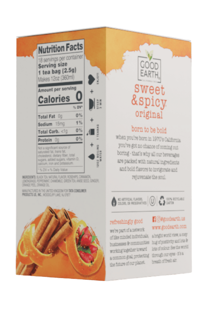 A box of Good Earth Tea Company sweet & spicy original tea bags, featuring a white and orange design with illustrations of citrus fruits and a small red chili pepper.